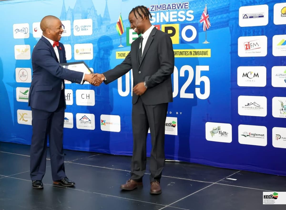 Emperor Roy receiving award at UK-Zimbabwe Business Expo